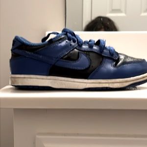 Blue and black Nikes
